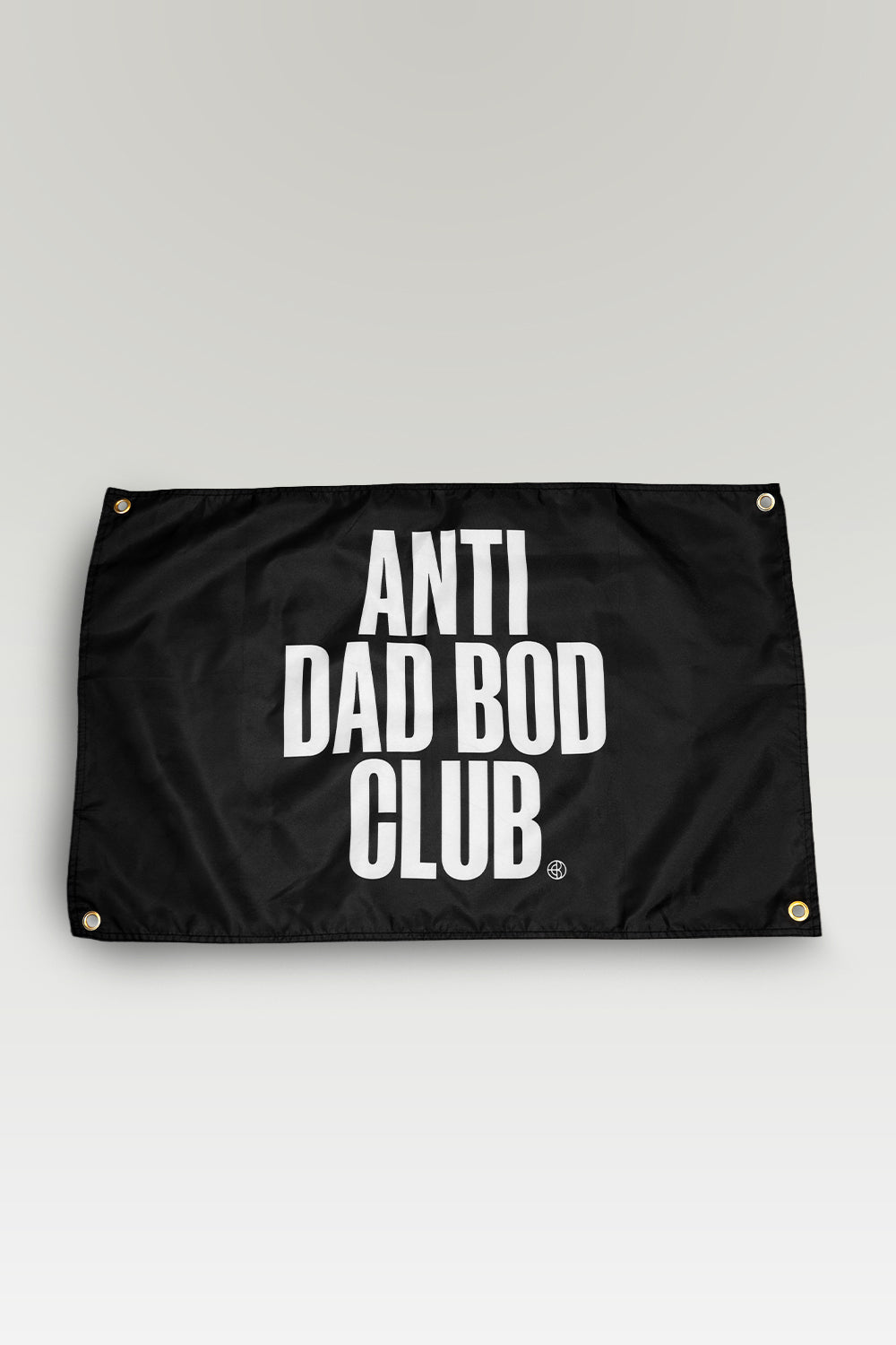 Black flag with 'ANTI DAD BOD CLUB' text on a light gray background