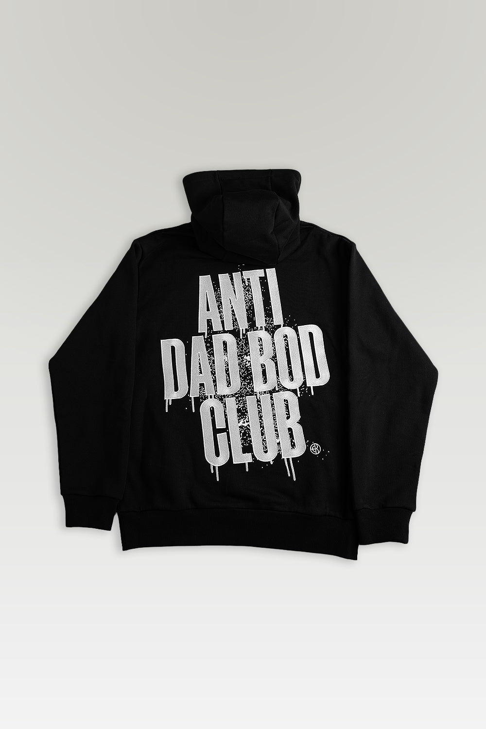 A black pullover hoodie shown from the back, featuring a large white embroidery graphic that reads 'ANTI DAD BOD CLUB', set against a light gray gradient background.