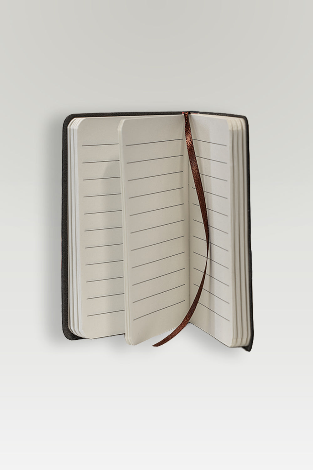 Open notebook with lined pages on a white background