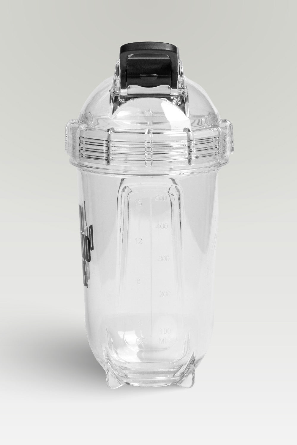 Clear plastic shaker with black lid on a light gray background