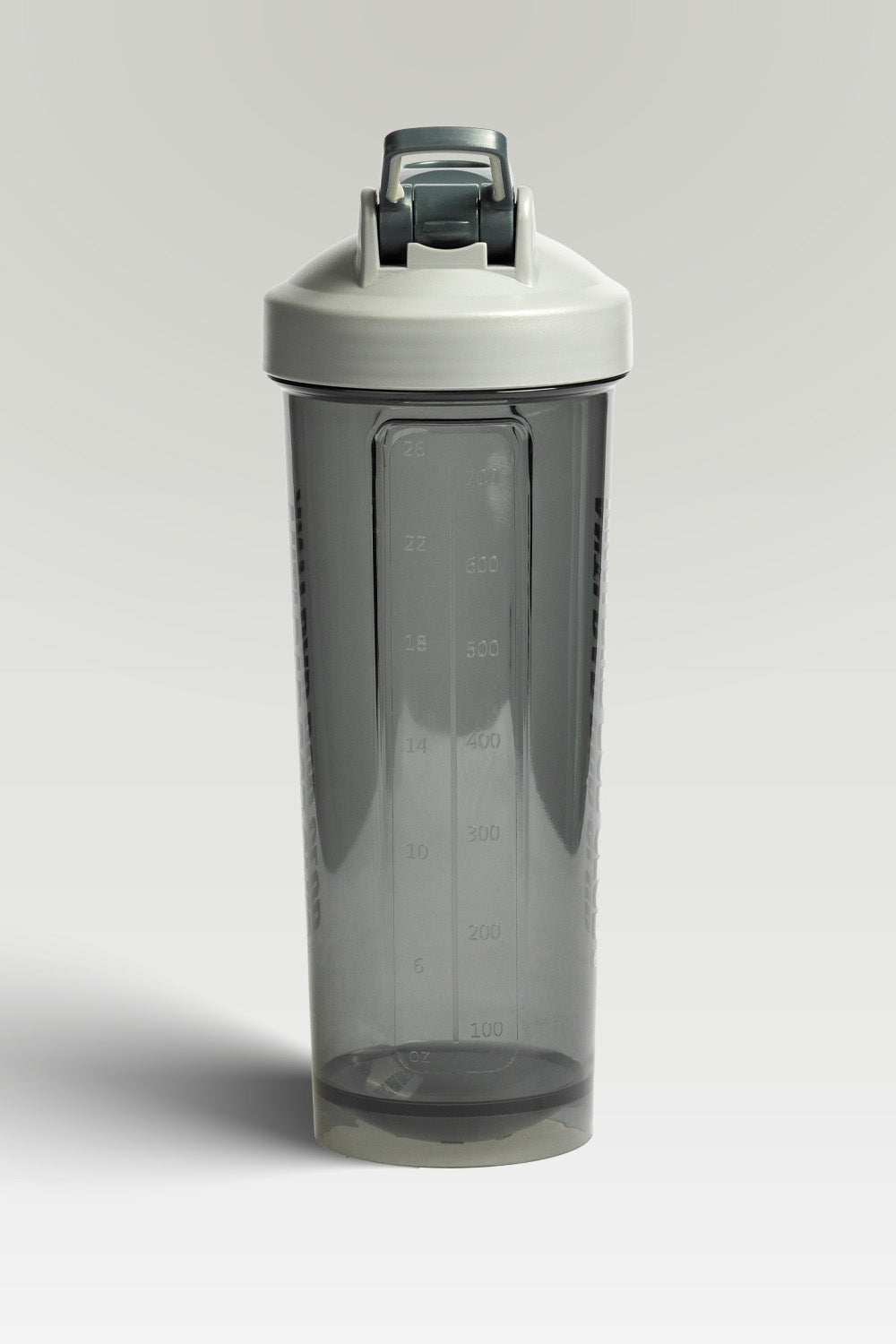 Gray shaker with a white cap on a light gray background