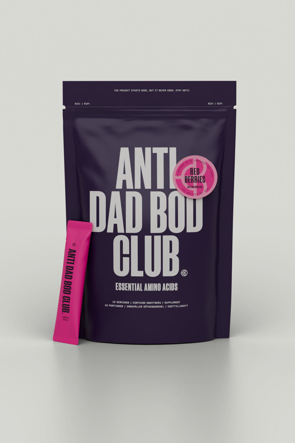 Purple package of 'Anti Dad Bod Club' with a pink stick on a gray background