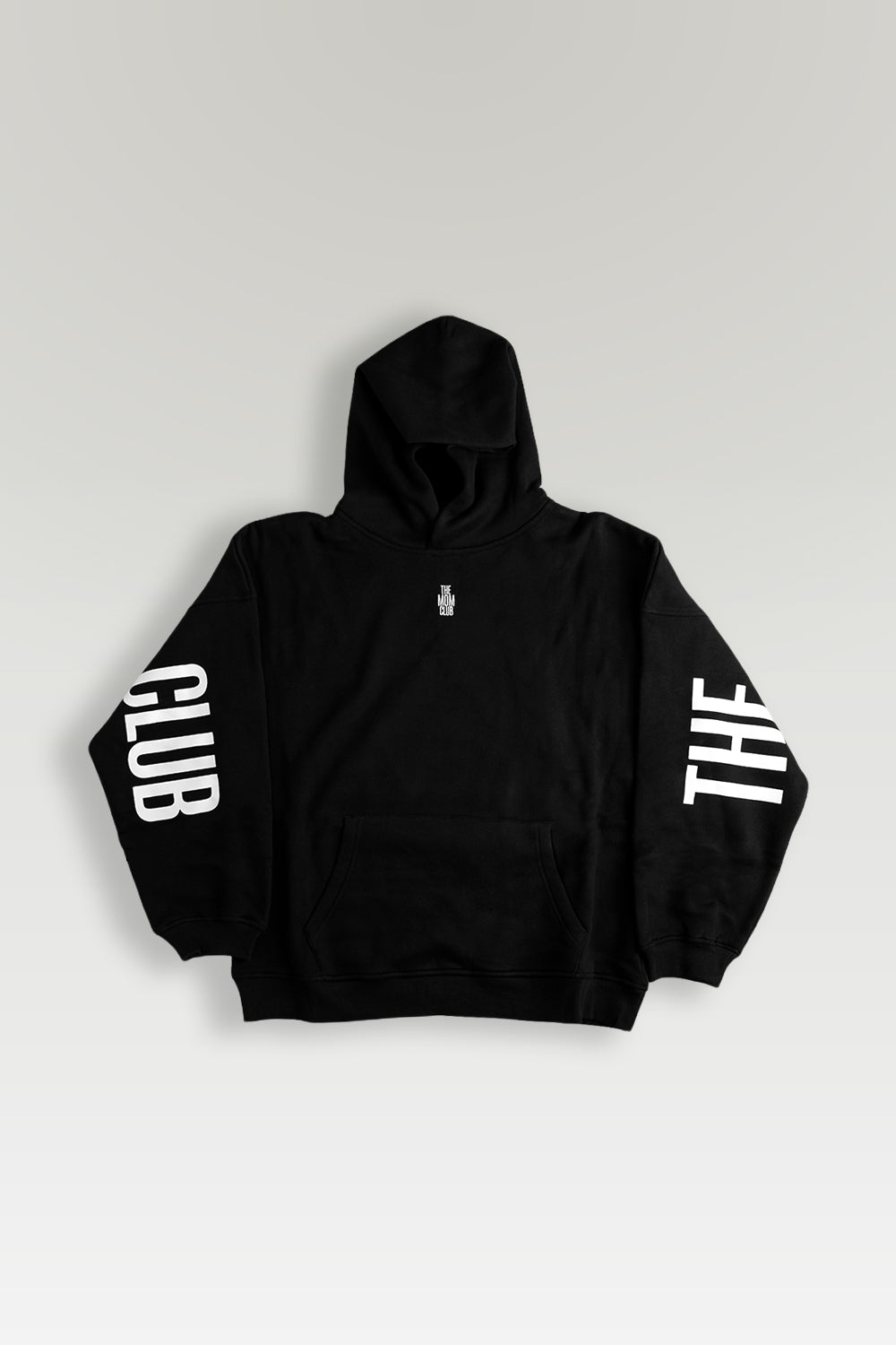 A black pullover hoodie with a small white embroidered logo on the center chest, displayed against a light gray gradient background.